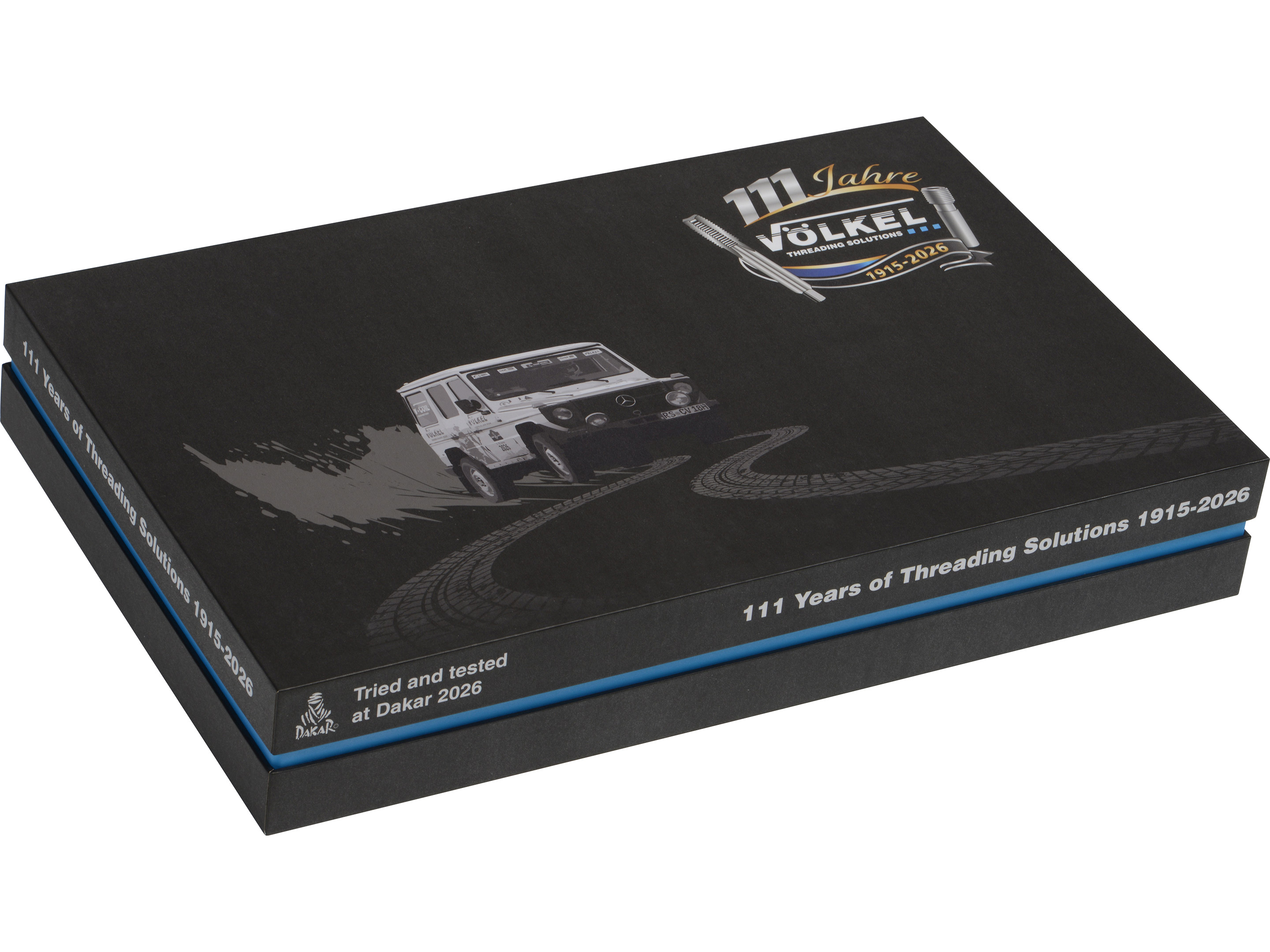 VÖLKEL Jubiläumsbox 111 Jahre Threading Solutions, Dakar 2026 Edition mit Mercedes G-Klasse Grafik.