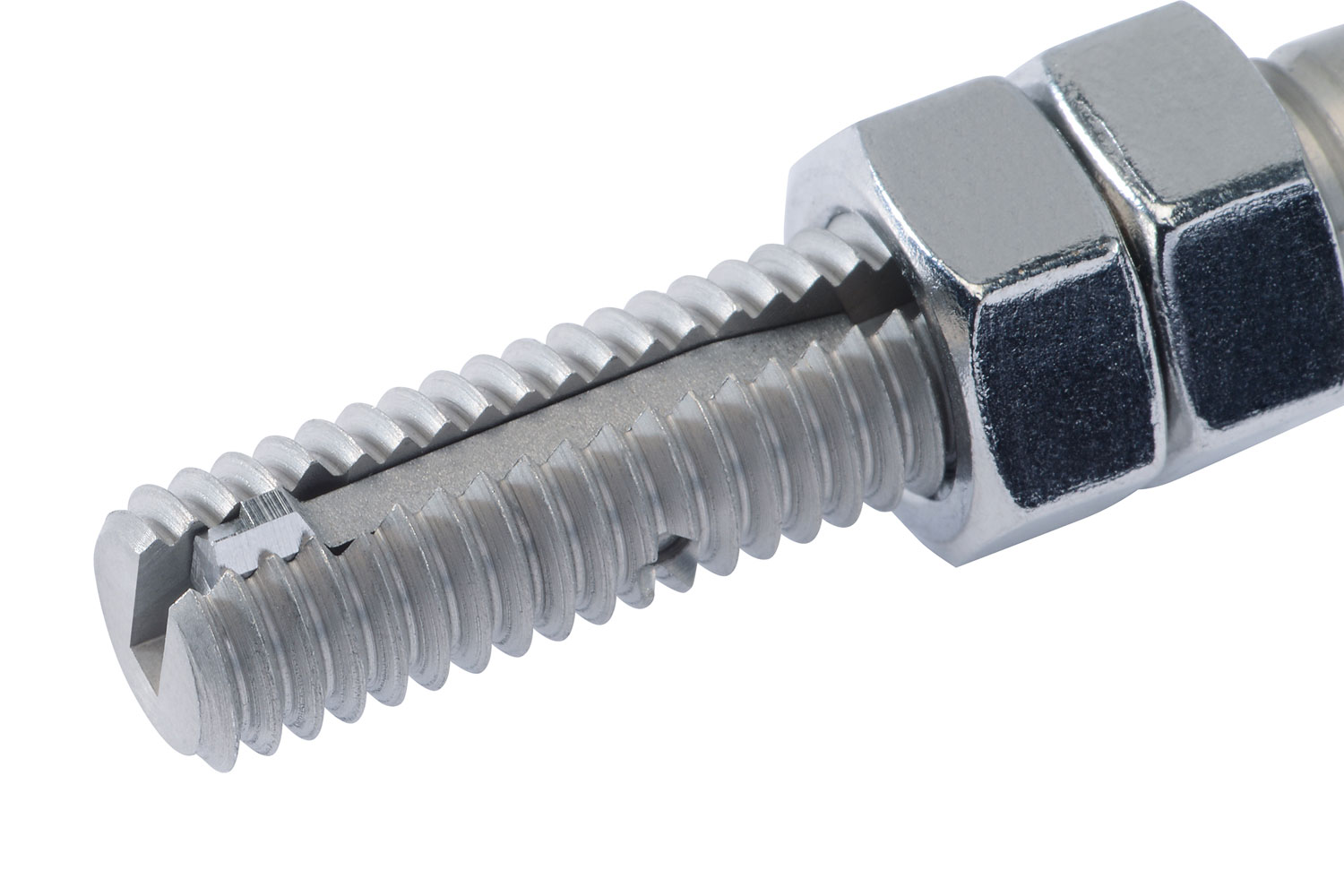 V-COIL Einbaukopf Detail Metallischer V-COIL Kopf mit Gewindegängen und hexagonaler Form.