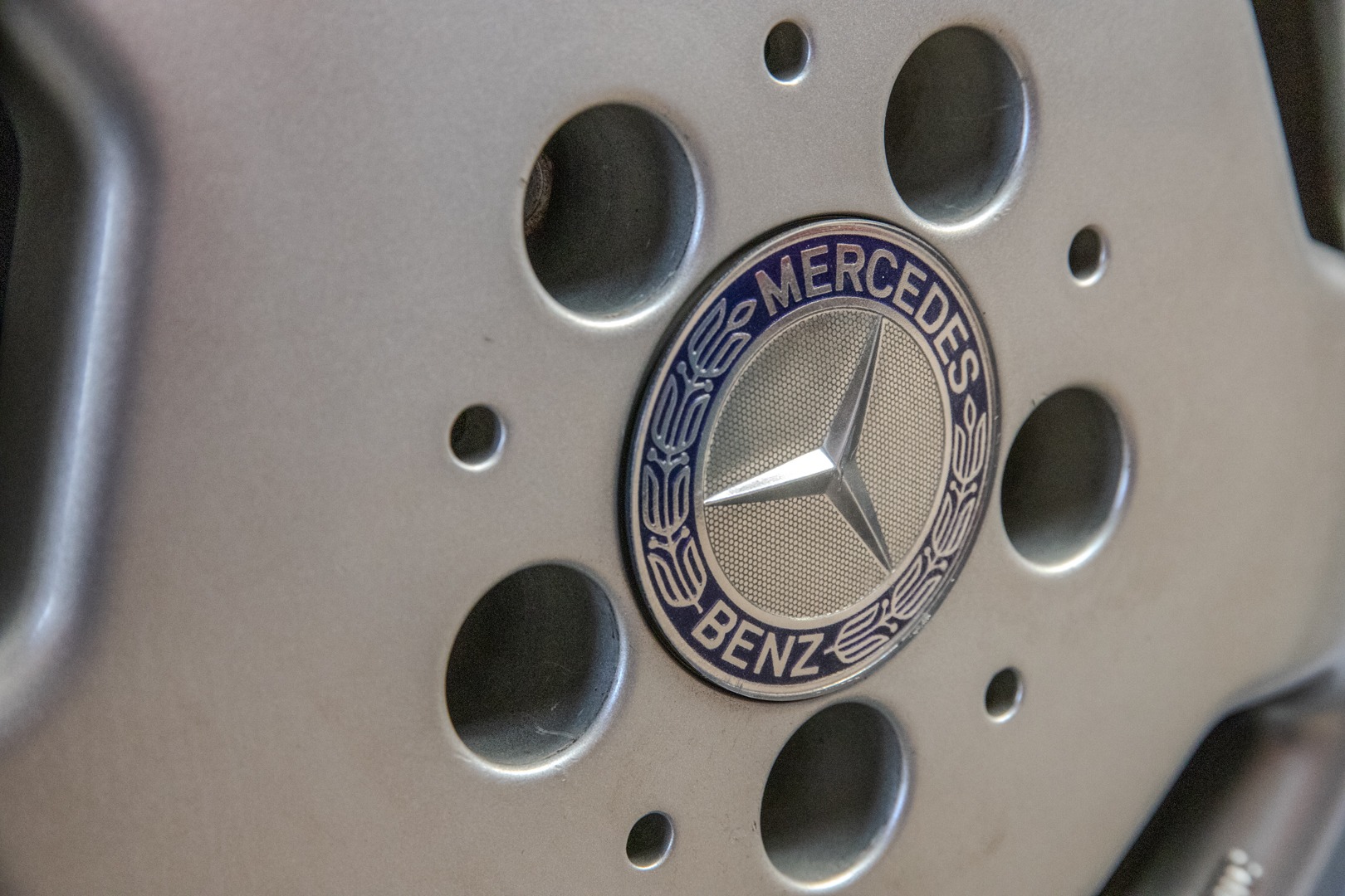 Close-up of wheel and emblem